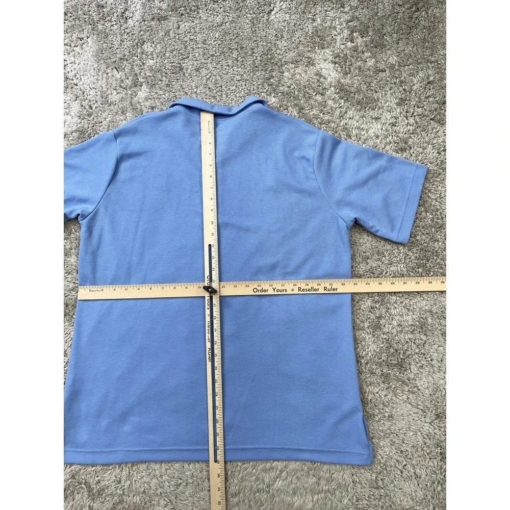 Jordan Men’s Polo Shirt in Carolina Blue with UNC Logo